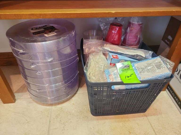 Disposable dishes cups forks knifes and spoons image