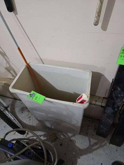 Trash can and yard stakes image