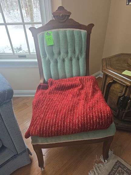 Vintage chair with heavy throw blanket image