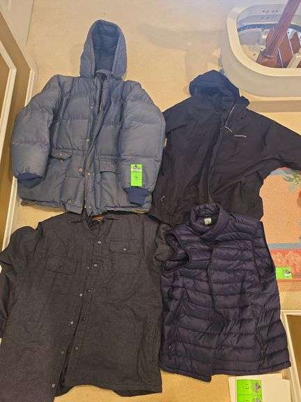 Assorted mens winter wear. 1 XL Eddie Bauer  jacket, 1 XXL patagonia jacket, 1XXL rugged elements jacket, and 1XXL weather proof vest image