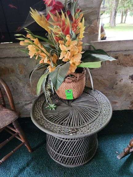 Wicker stand and flower arrangement