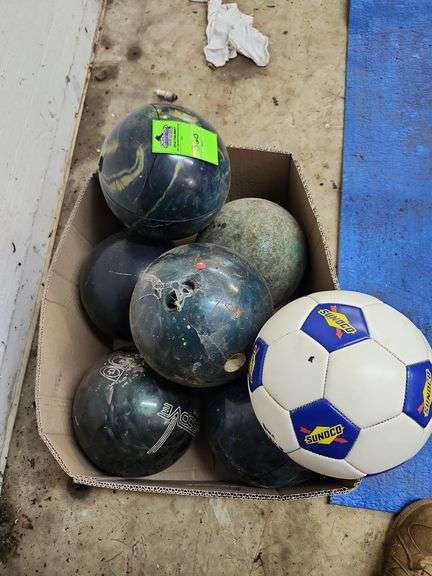 Bowling balls and one soccer ball