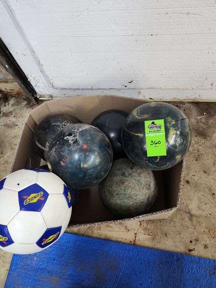 Bowling balls and one soccer ball