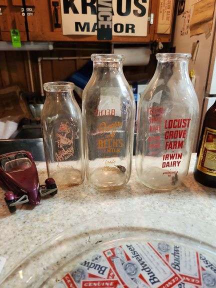 Milk bottles, beer bottles, Budweiser serving tray, and cars