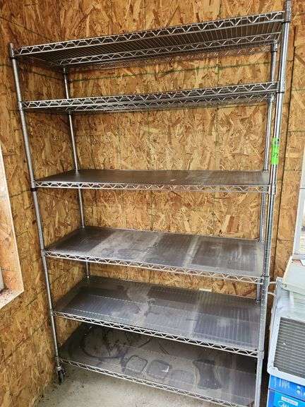 Metal shelving rack on wheels 6 shells 4 ft wide