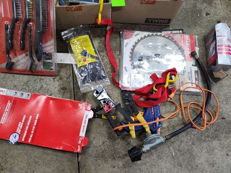 Tools, saw blades, air conditioning gauges, threatsetter River gun, nails