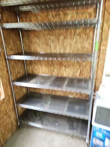 Metal shelving rack on wheels 6 shells 4 ft wide