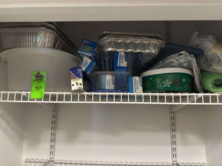 Contents of top shelf in closet