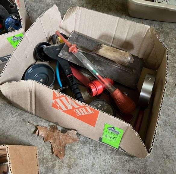 Oil filter, wrenches, and small trowel