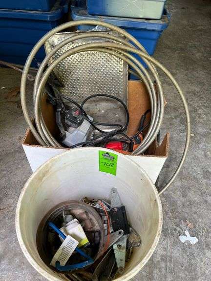 Drill, work light, paint pan, assorted long bolts