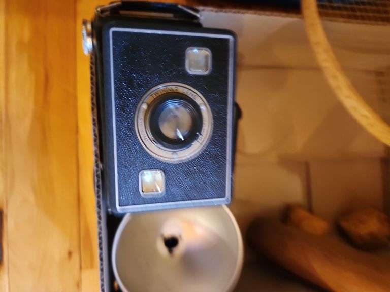 Cameras with miscellaneous items