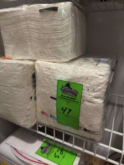 Three packages of unopened napkins