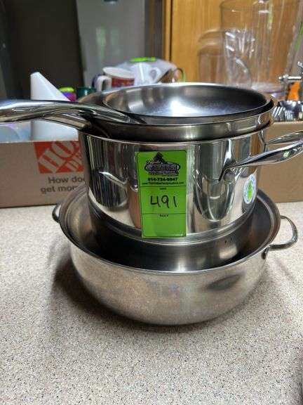 Pots and pans some with lids