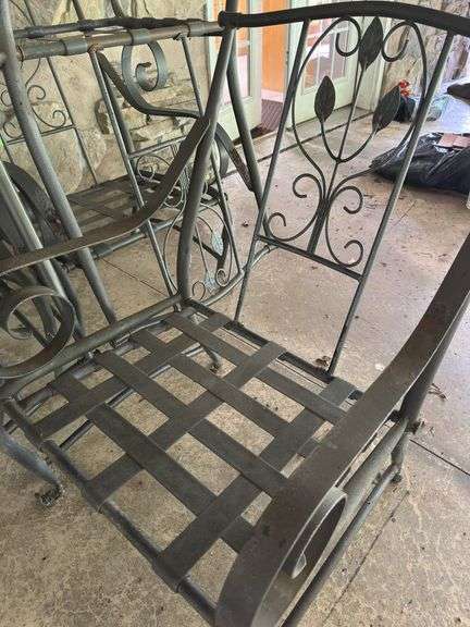 Five outdoor metal chairs