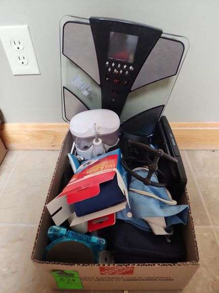 Scale and miscellaneous bathroom supplies
