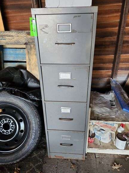 Four drawer metal filing cabinet