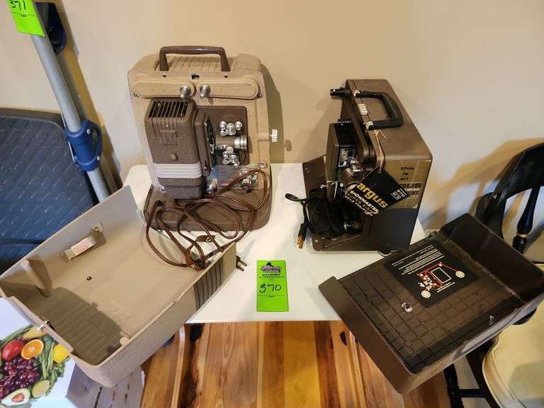 Antique movie projectors quantity of two