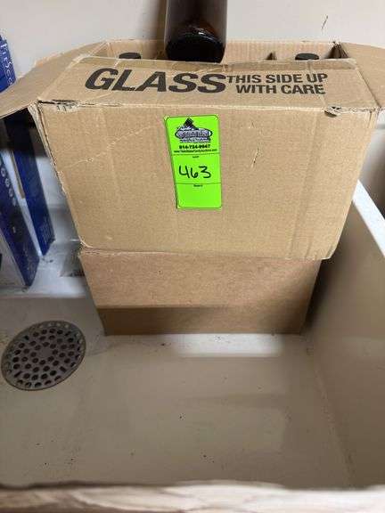 Two unopened cases of glass bottles