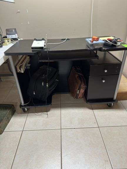 Black desk on wheels two briefcases ￼