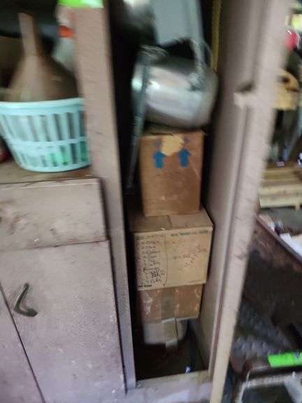 Metal storage container and contents