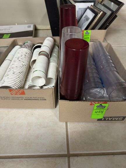 Two boxes, one box of miscellaneous sized paper cups, one box, miscellaneous size, plastic, cups, and plastic silverware