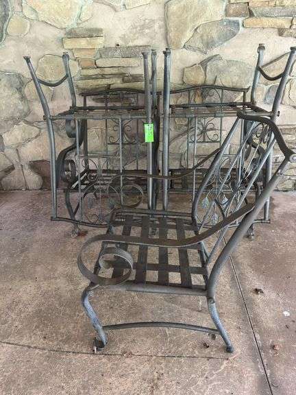 Five outdoor metal chairs