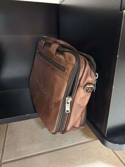Black desk on wheels two briefcases ￼