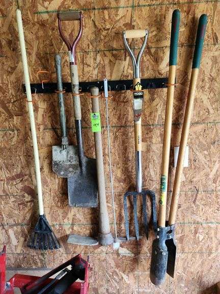 Post hole digger, pick, shovels