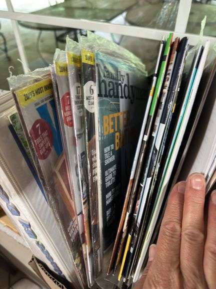 Box of miscellaneous magazines, information booklets ￼