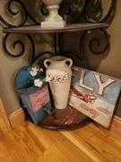 Metal corner shelf with contents