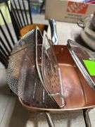 Copper pan with steamer basket