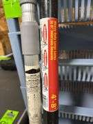 Set of plastic stackable bins and two security poles