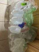 Unused milk sized plastic jugs with lids