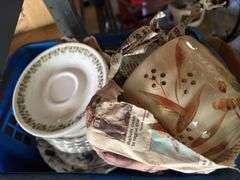 Assorted dishes, bin of rags