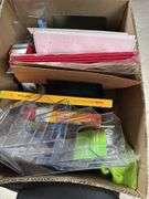 Black office chair with box of office supplies