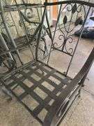 Five outdoor metal chairs