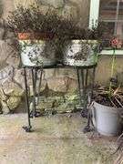 Large outdoor pots and planters, one metal rolling plant stand