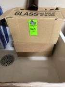 Two unopened cases of glass bottles