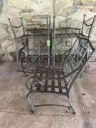 Five outdoor metal chairs