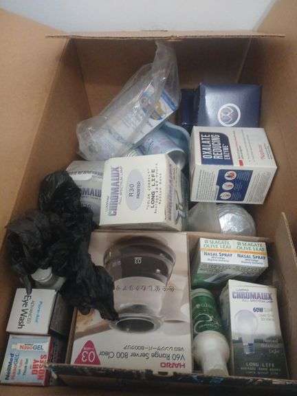 Box of random bathroom supplies image