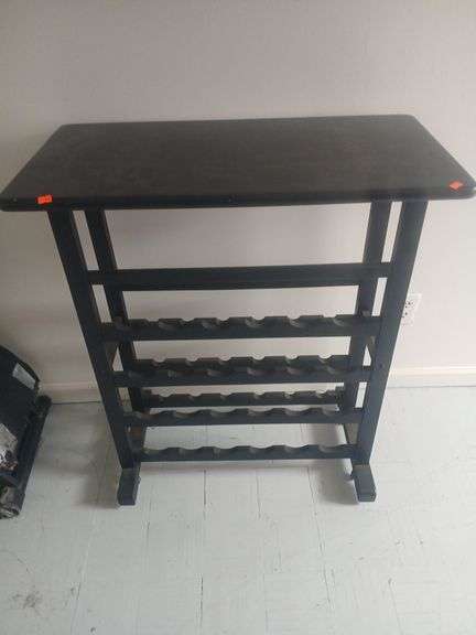 Black wooden wine rack. image