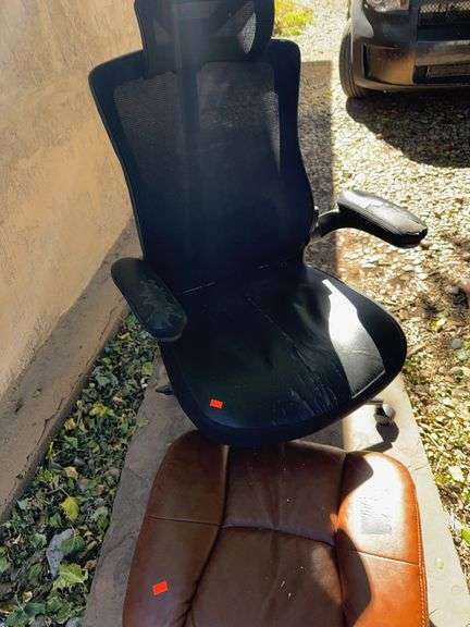 Brown foot rest and chair image