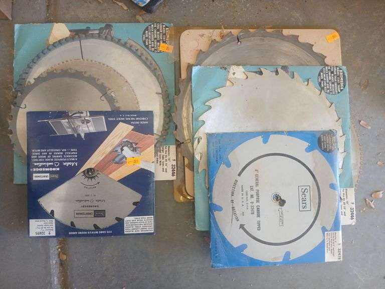 Stack of nine saw blades image