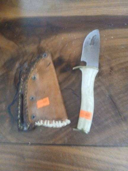 Antler knife with leather sheath. image