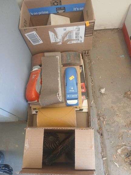 Box/stack of sandpaper buff pads. image