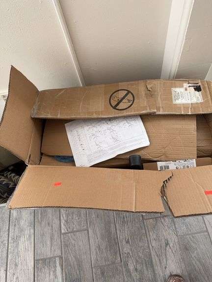 Office chair in box.  Needs assembly image