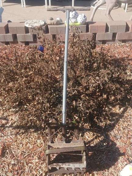 Antique yard tiller image