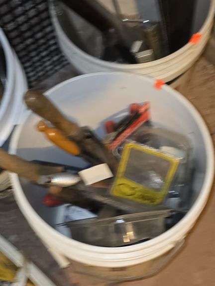 4 buckets of tools. image