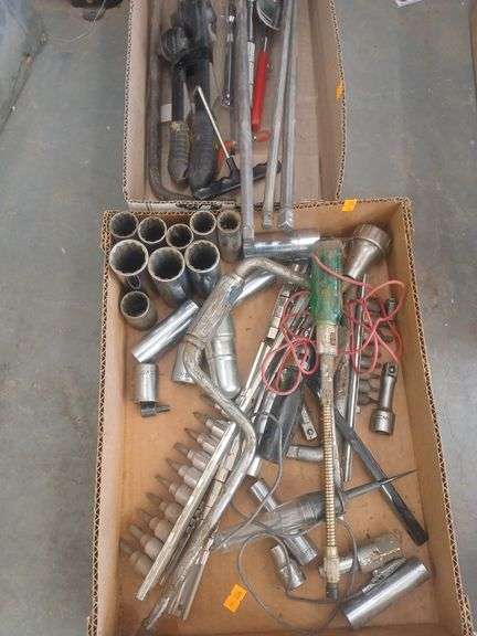 Box of rachets sockets and extensions. image