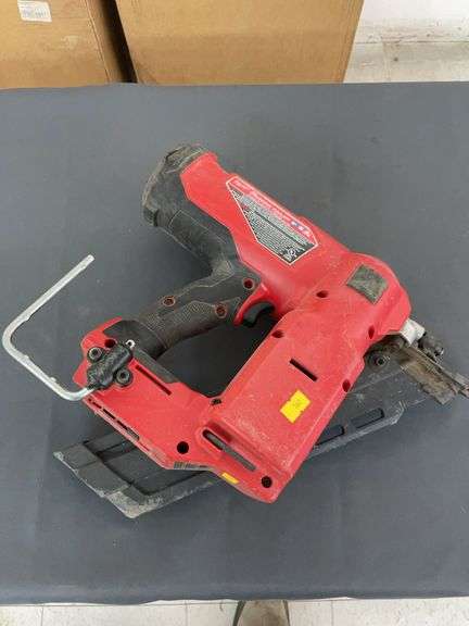 Cordless Milwaukee 30° framing nailer with no battery. image